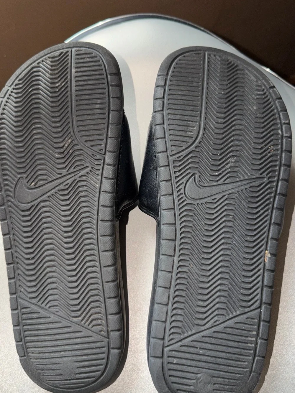 Nike Black Slide Sandals with Pink Logo